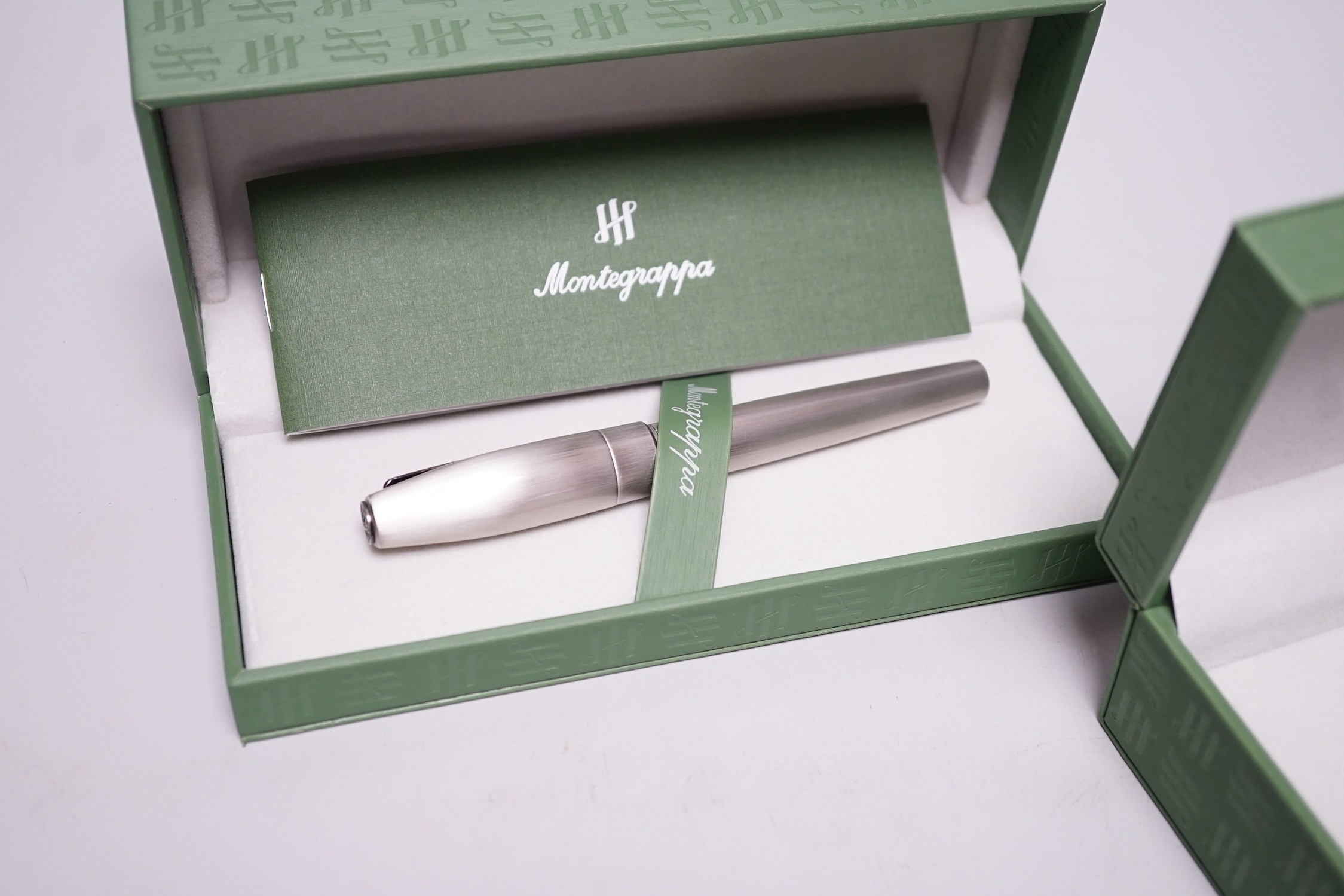Two Montegrappa fountain pens; Elmo 01 Black Star Calla Lily and Silver mule, cased
